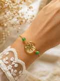 Bracelet en fleurs de carotte sauvage naturelles & perles de verre vertes