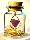Fiole avec pendentif cœur de pétale d’orchidée - Aux fleurs de Chloé Fiole avec pendentif cœur de pétale d’orchidée Collier Collier