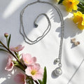 Collier femme enceinte boule hortensia - Aux fleurs de Chloé Collier femme enceinte boule hortensia Collier Collier